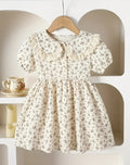 Vestido beige con flores